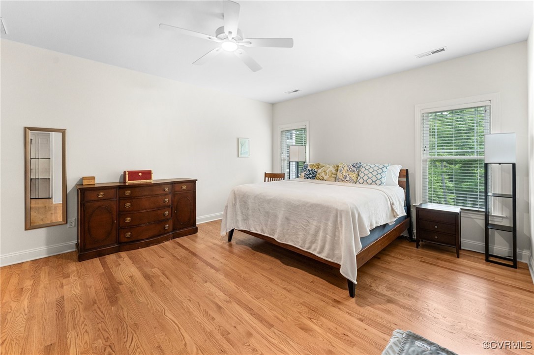 216 Edwin Circle Aylett, VA 23009 - Photo 17 of 27 a bedroom with a bed and a large window