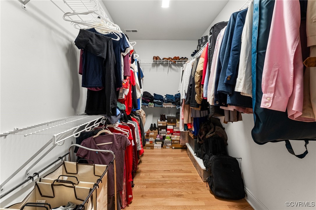 216 Edwin Circle Aylett, VA 23009 - Photo 18 of 27 a view of walk in closet with clothes and shoes