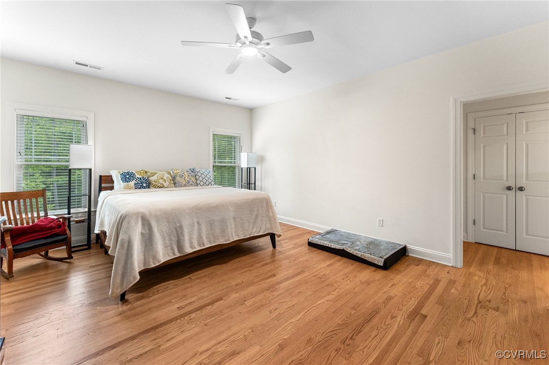 216 Edwin Circle Aylett, VA 23009 - Photo 21 of 27 a bedroom with a bed and a chandelier