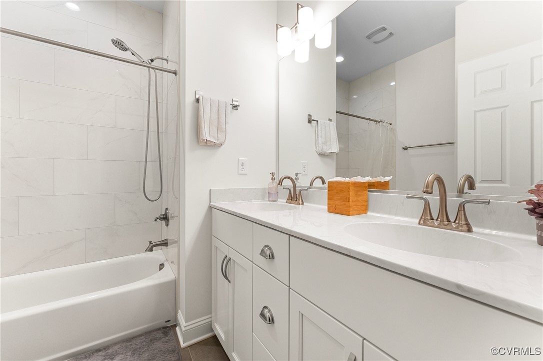 216 Edwin Circle Aylett, VA 23009 - Photo 23 of 27 a bathroom with a tub sink vanity granite and shower