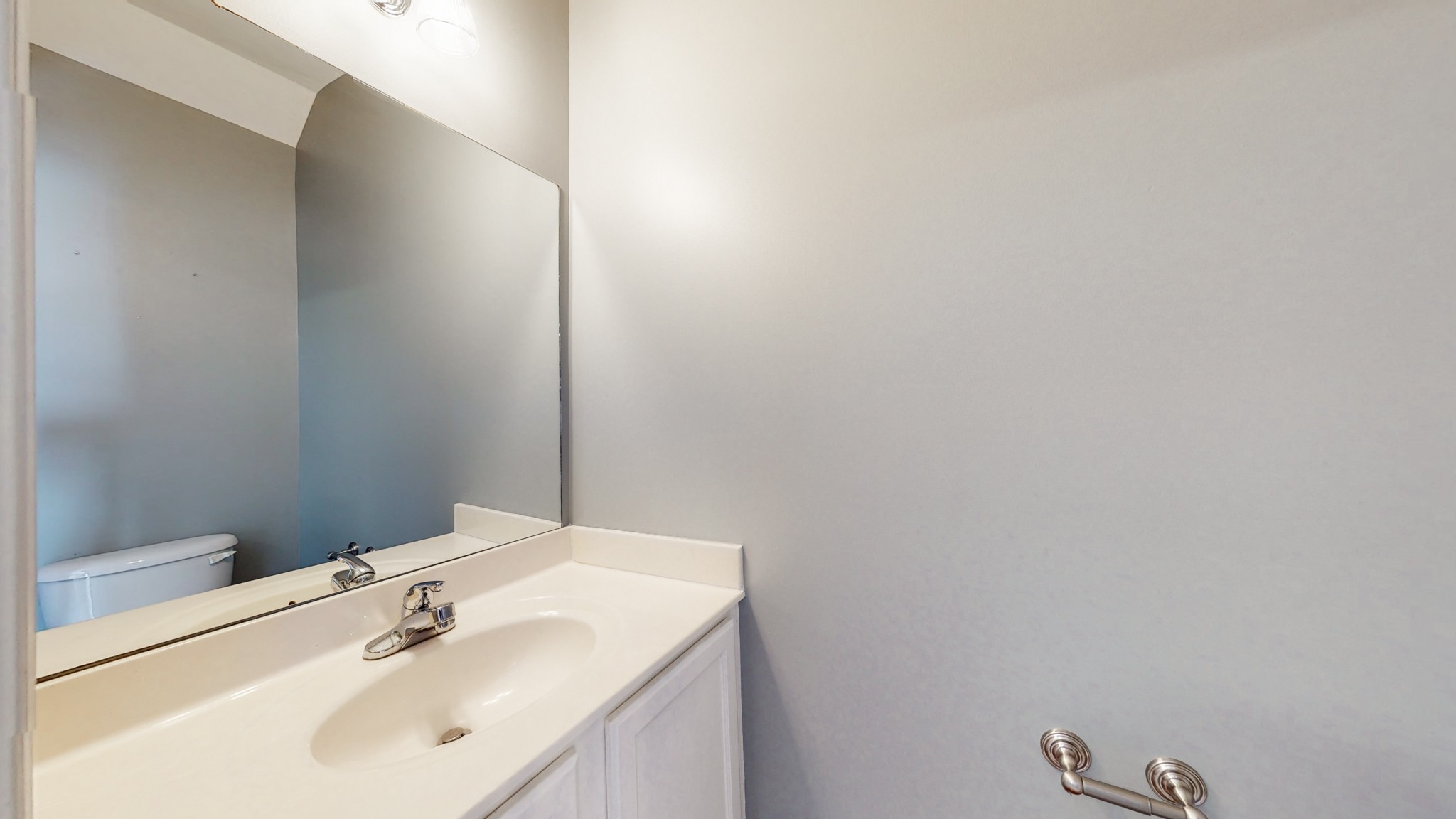1101 Downs Boulevard, Unit 93 Franklin, TN 37064 - Photo 14 of 38 a bathroom with a sink and a mirror