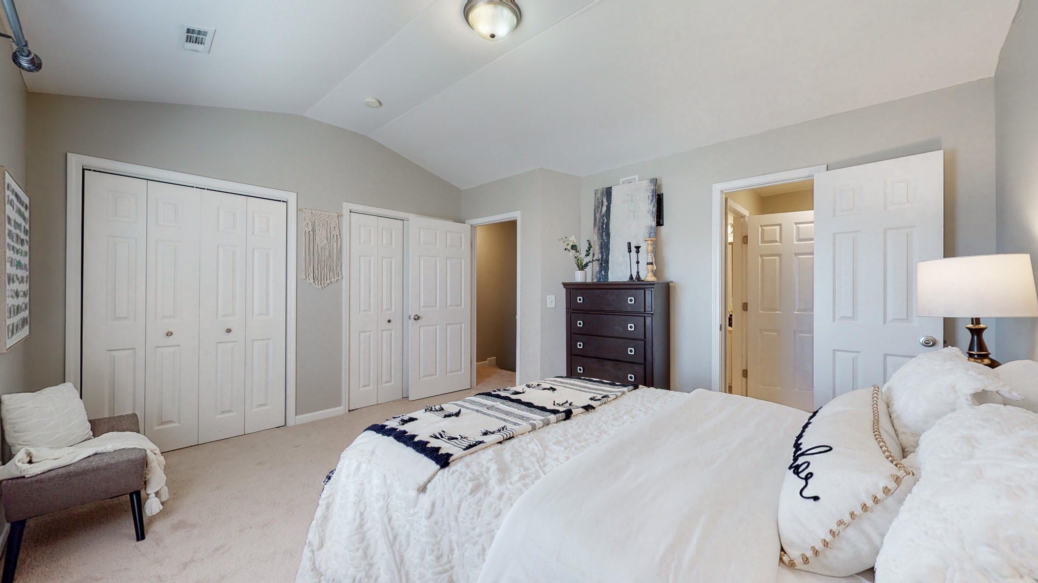 1101 Downs Boulevard, Unit 93 Franklin, TN 37064 - Photo 20 of 38 a bedroom with a bed and a lamp