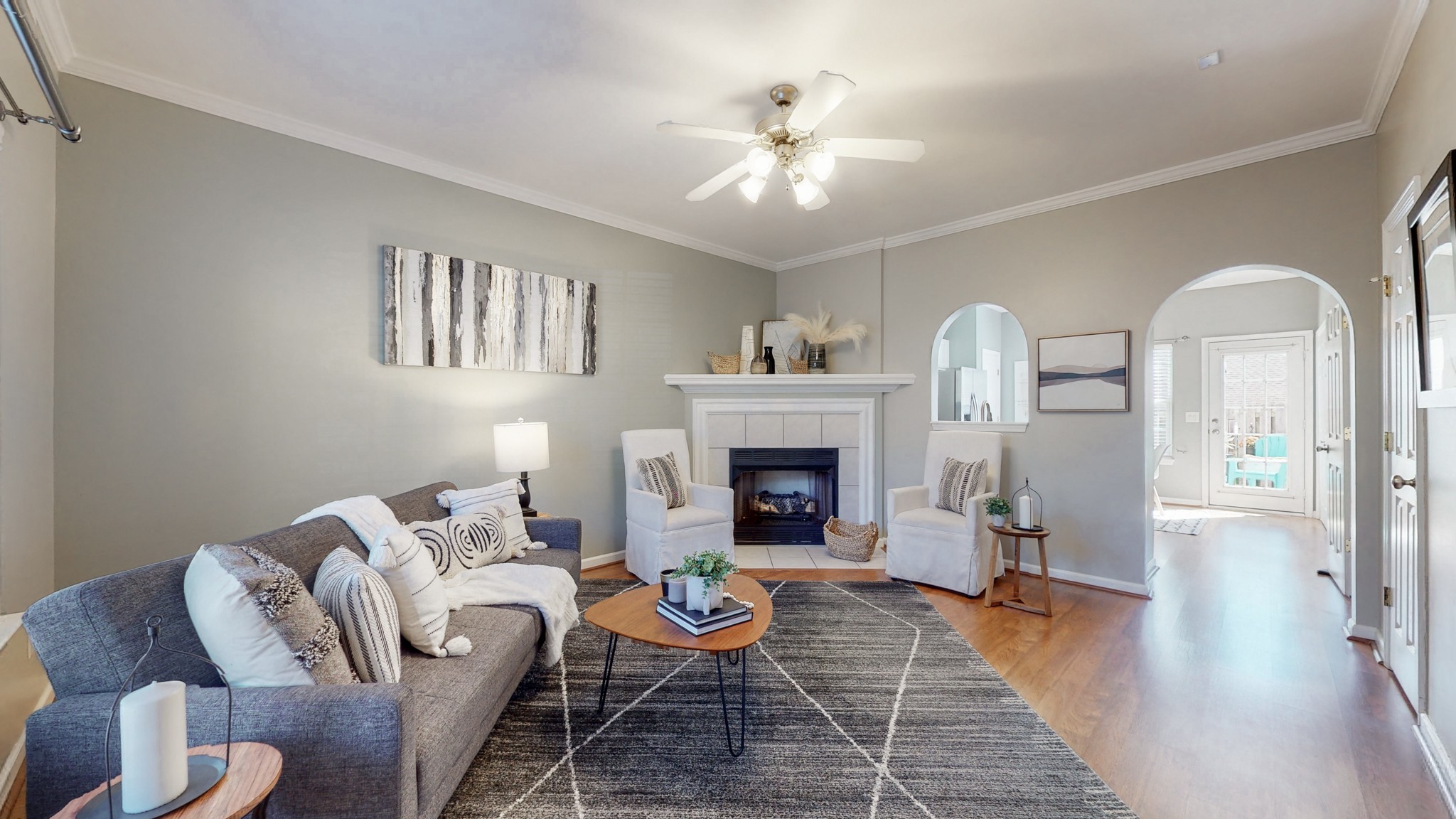 1101 Downs Boulevard, Unit 93 Franklin, TN 37064 - Photo 2 of 38 a living room with furniture and a fireplace