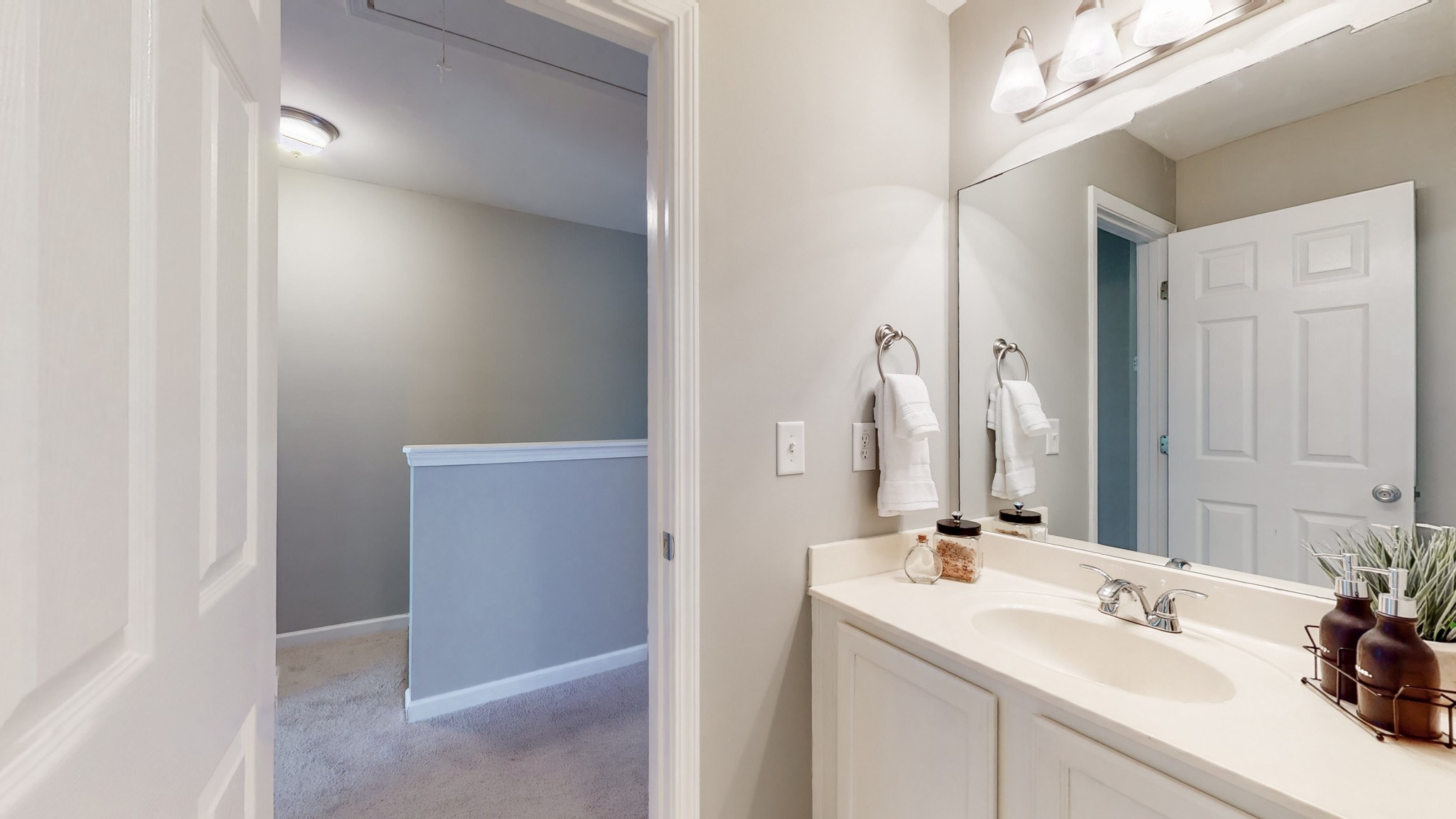 1101 Downs Boulevard, Unit 93 Franklin, TN 37064 - Photo 24 of 38 a bathroom with a double vanity sink and mirror