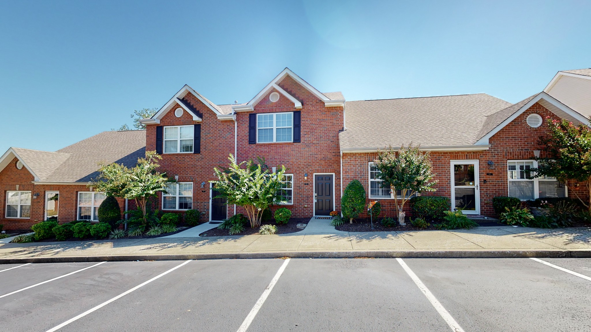1101 Downs Boulevard, Unit 93 Franklin, TN 37064 - Photo 28 of 38 front view of a house with a yard