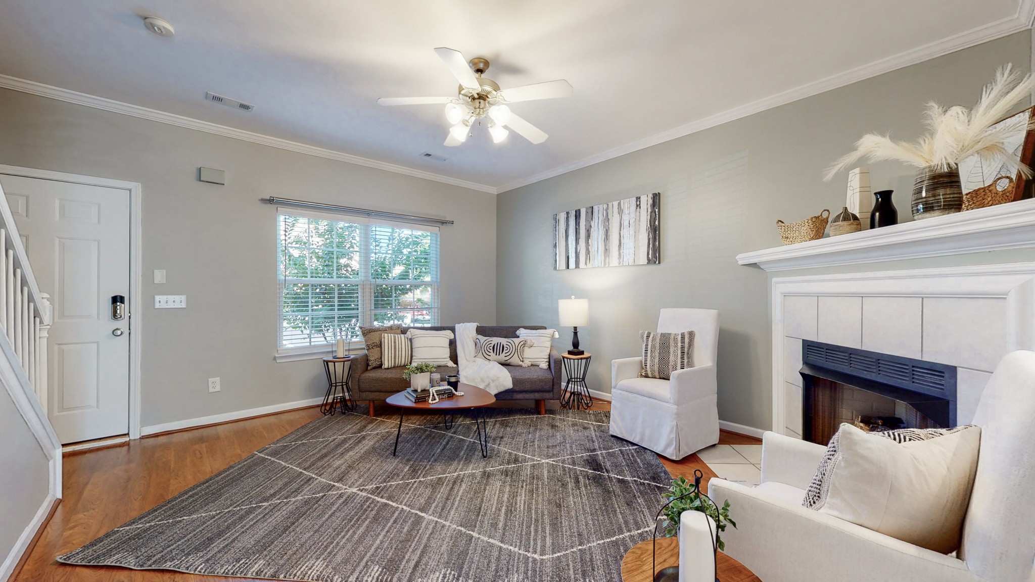 1101 Downs Boulevard, Unit 93 Franklin, TN 37064 - Photo 3 of 38 a living room with furniture and a fireplace