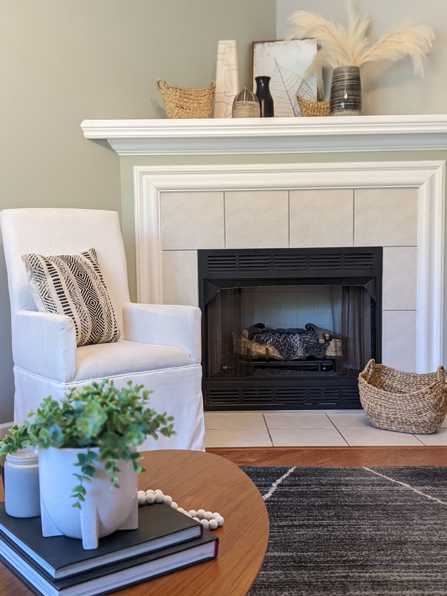 1101 Downs Boulevard, Unit 93 Franklin, TN 37064 - Photo 4 of 38 a living room with a fireplace and potted plant