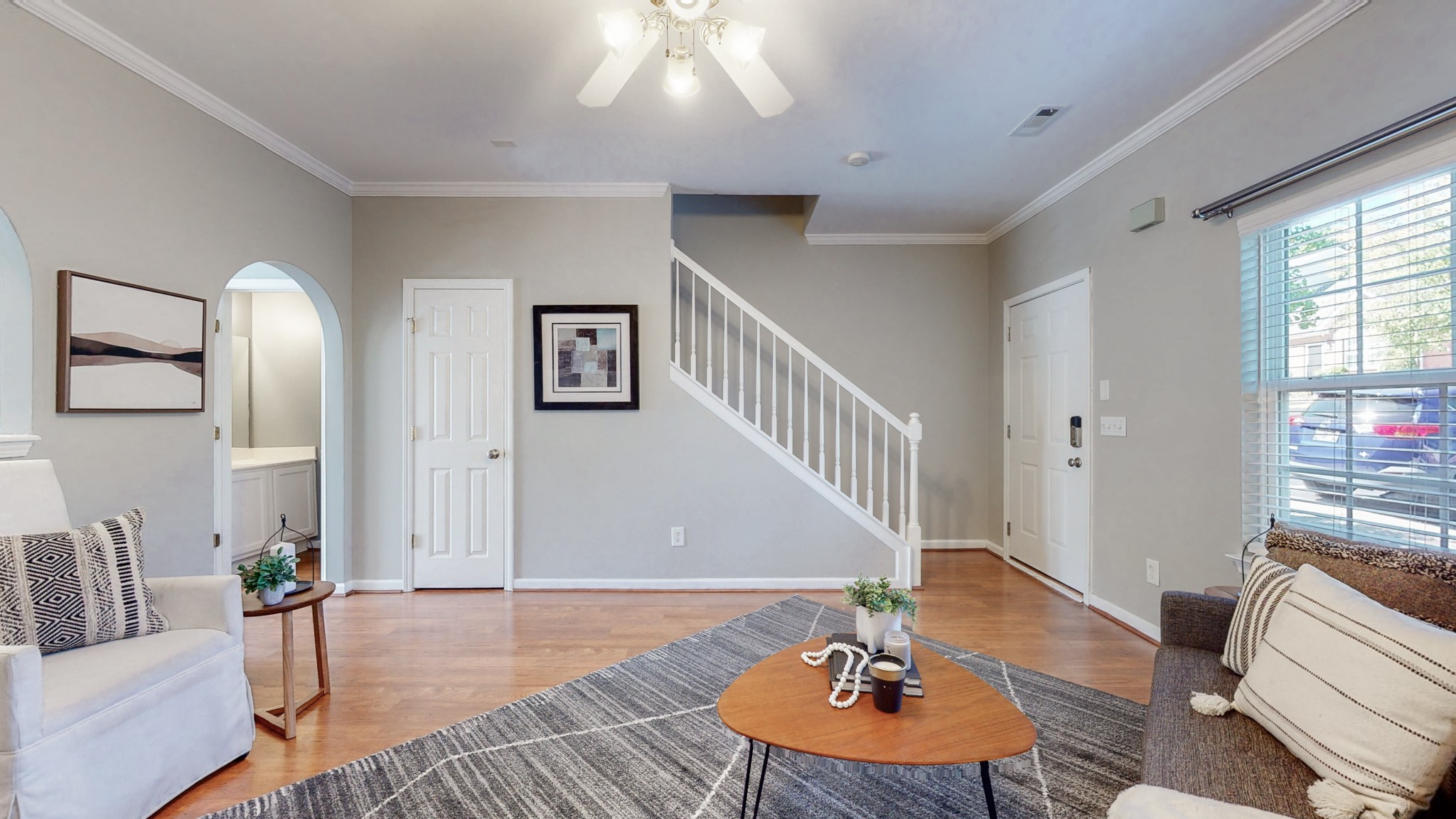 1101 Downs Boulevard, Unit 93 Franklin, TN 37064 - Photo 5 of 38 a living room with furniture and a wooden floor