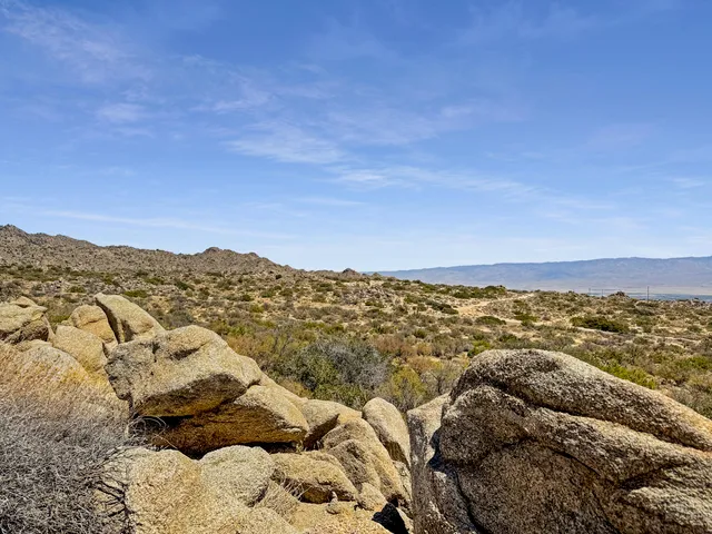 a view of a city with mountains in the background
