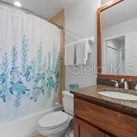 a close view of a utility room with dryer and washer