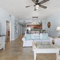 a view of living room with granite countertop furniture and fireplace