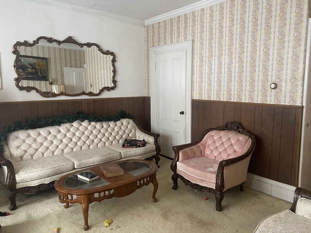 25 West Baltimore Street Lynn, MA 01902 - Photo 5 of 15 a bedroom with a bed and a window