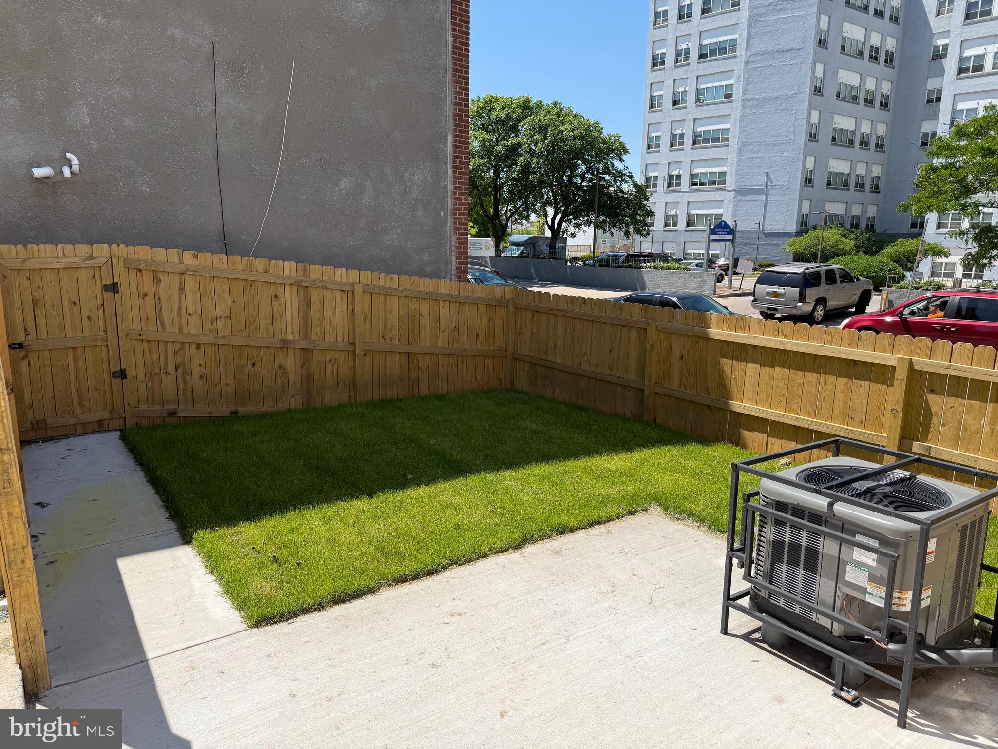 703 East Preston Street Baltimore, MD 21202 - Photo 19 of 26 a view of a backyard with plants and outdoor seating