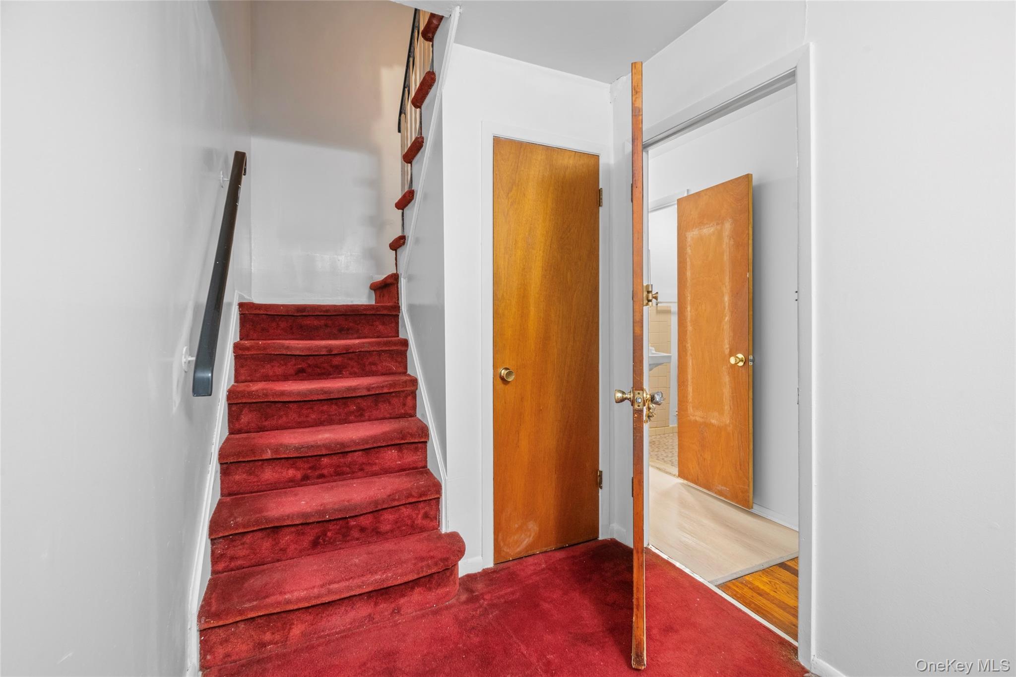 178-59 Wexford Terrace Queens, NY 11432 - Photo 20 of 45 a view of a hallway with front door