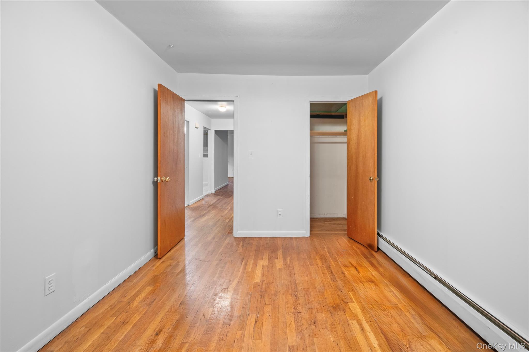 178-59 Wexford Terrace Queens, NY 11432 - Photo 29 of 45 a view of wooden floor in an empty room