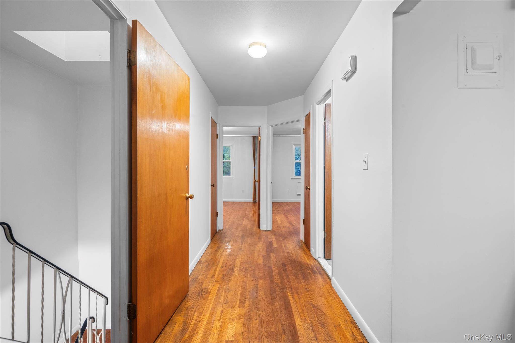 178-59 Wexford Terrace Queens, NY 11432 - Photo 38 of 45 a view of a hallway with wooden floor