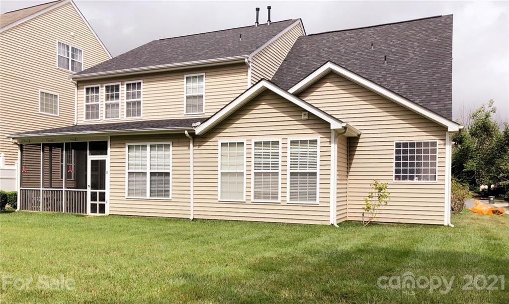 13338 Mallard Landing Road Charlotte, NC 28278 - Photo 2 of 2 a front view of a house with a garden