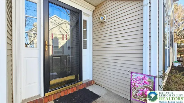 a view of front door and bedroom