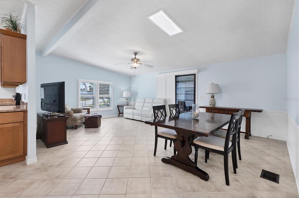 159 Osprey Circle Ellenton, FL 34222 - Photo 10 of 37 a view of a livingroom with furniture and a flat screen tv