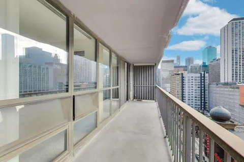 a view of city with tall buildings