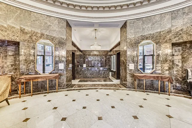 a view of a entryway with a front door