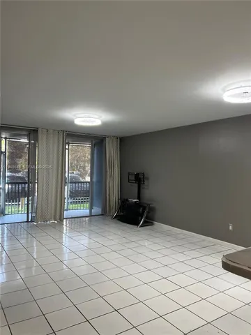 a view of a livingroom with entryway