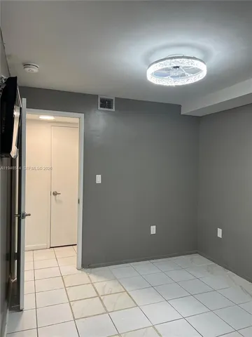 en empty room with windows