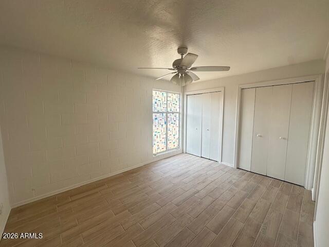 1101 East Bethany Home Road, Unit 16 Phoenix, AZ 85014 - Photo 11 of 15 a view of an empty room with a window