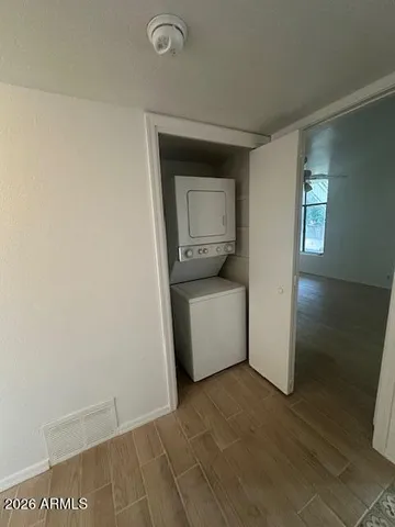 a utility room with a sink dryer and washer