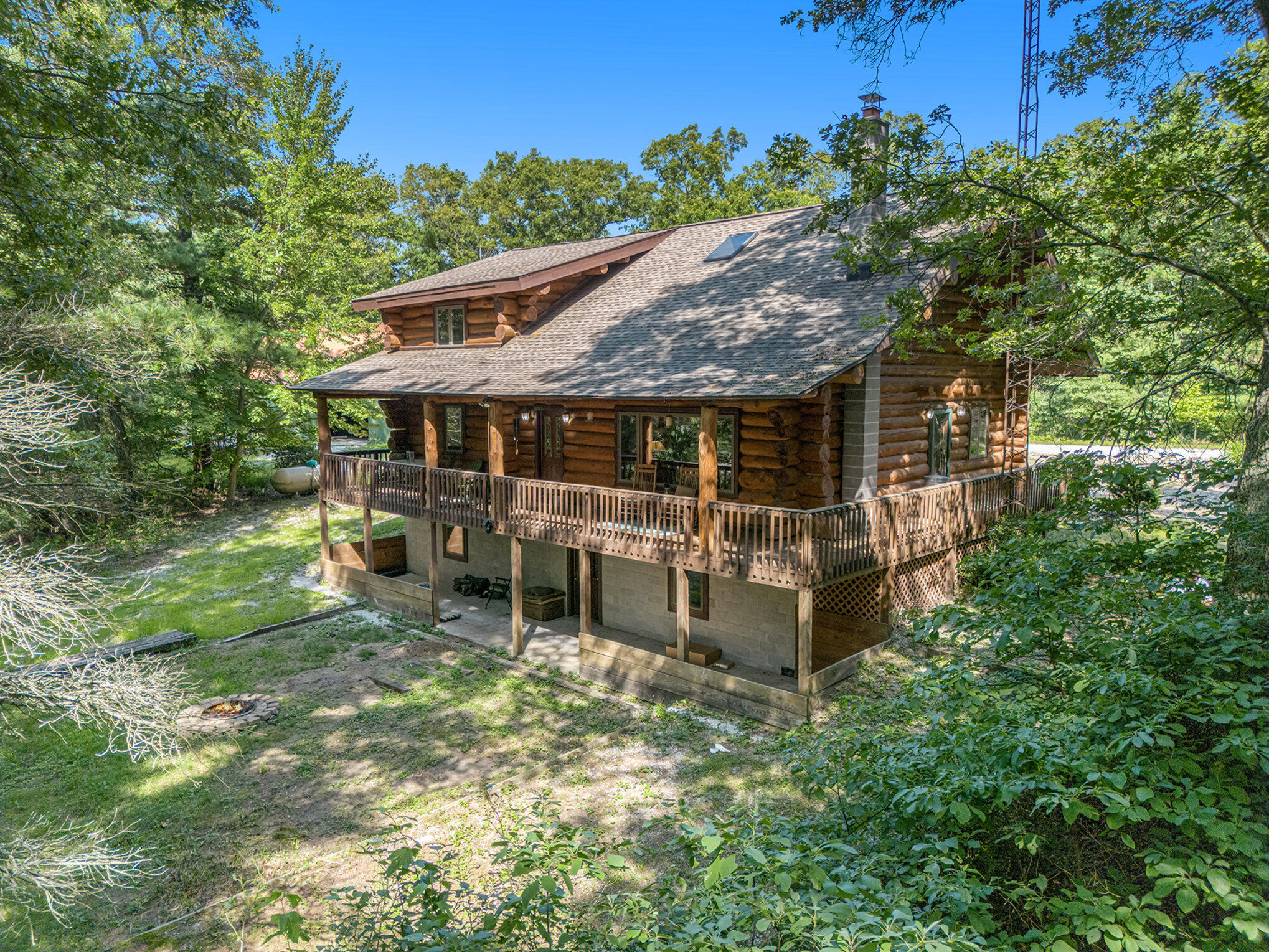 5665 Staple Road Twin Lake, MI 49457 - Photo 1 of 35 5665 Staple Rd, Twin Lake Michigan Log H