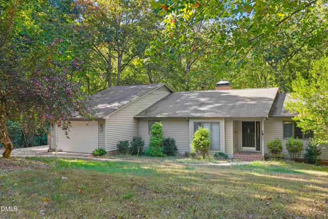 a house view with a garden space