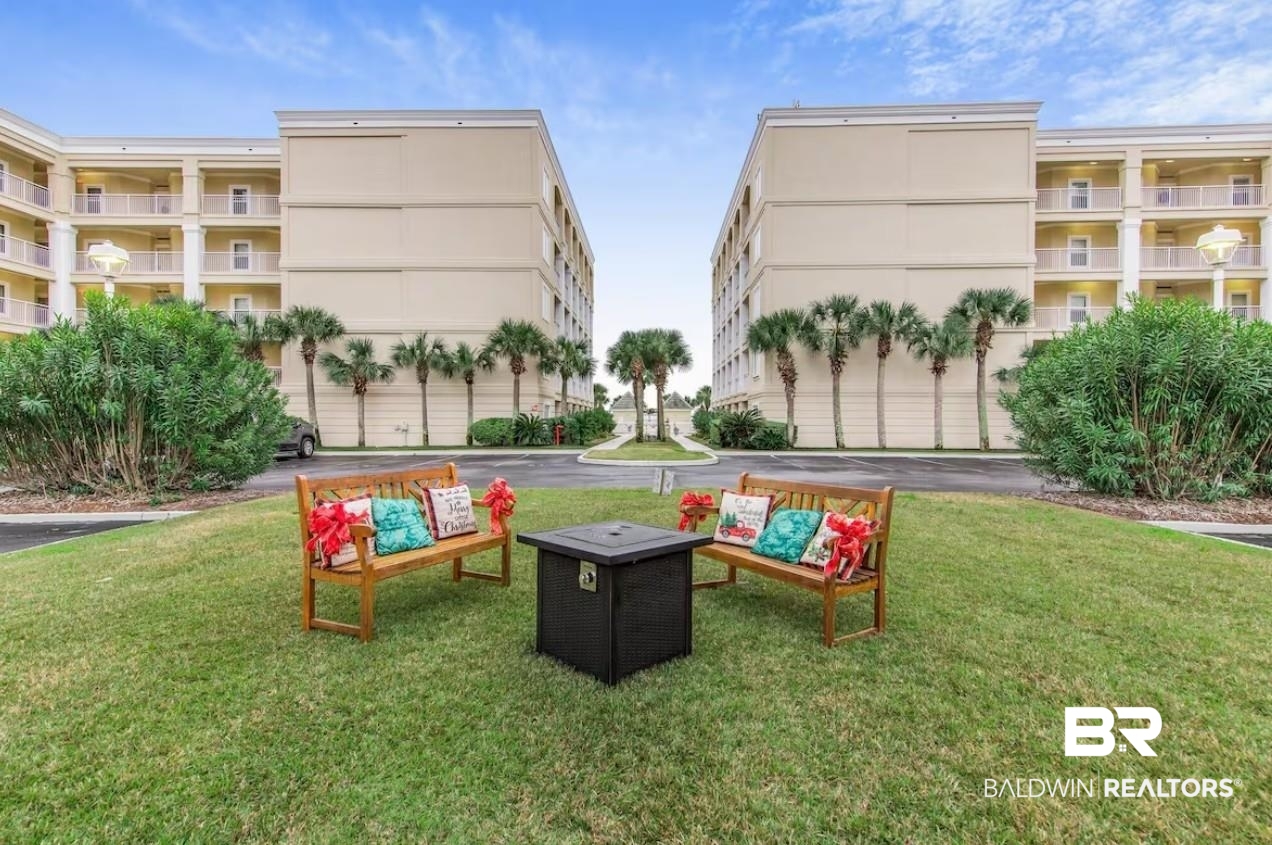 27770 Canal Road, Unit 2502 Orange Beach, AL 36561 - Photo 37 of 55 View of home's community featuring a lawn