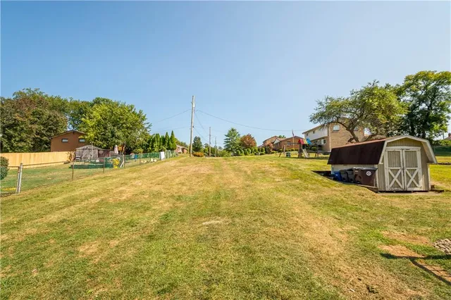 a house view with swimming pool in the background
