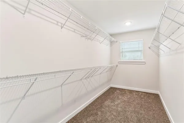 a view of a room with racks on the wall