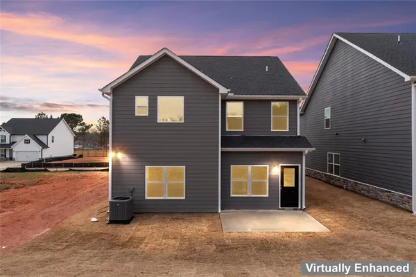 a front view of house with an outdoor space