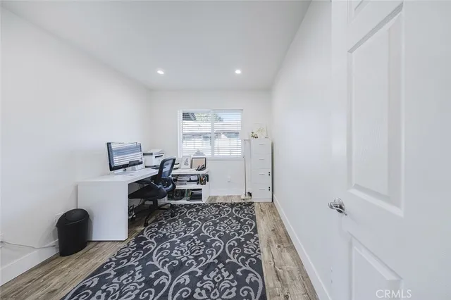 a workspace with furniture and a window