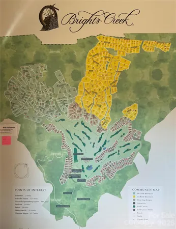 a wooden bench sitting in the middle of a forest