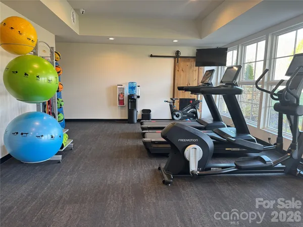 a view of a room with gym equipment