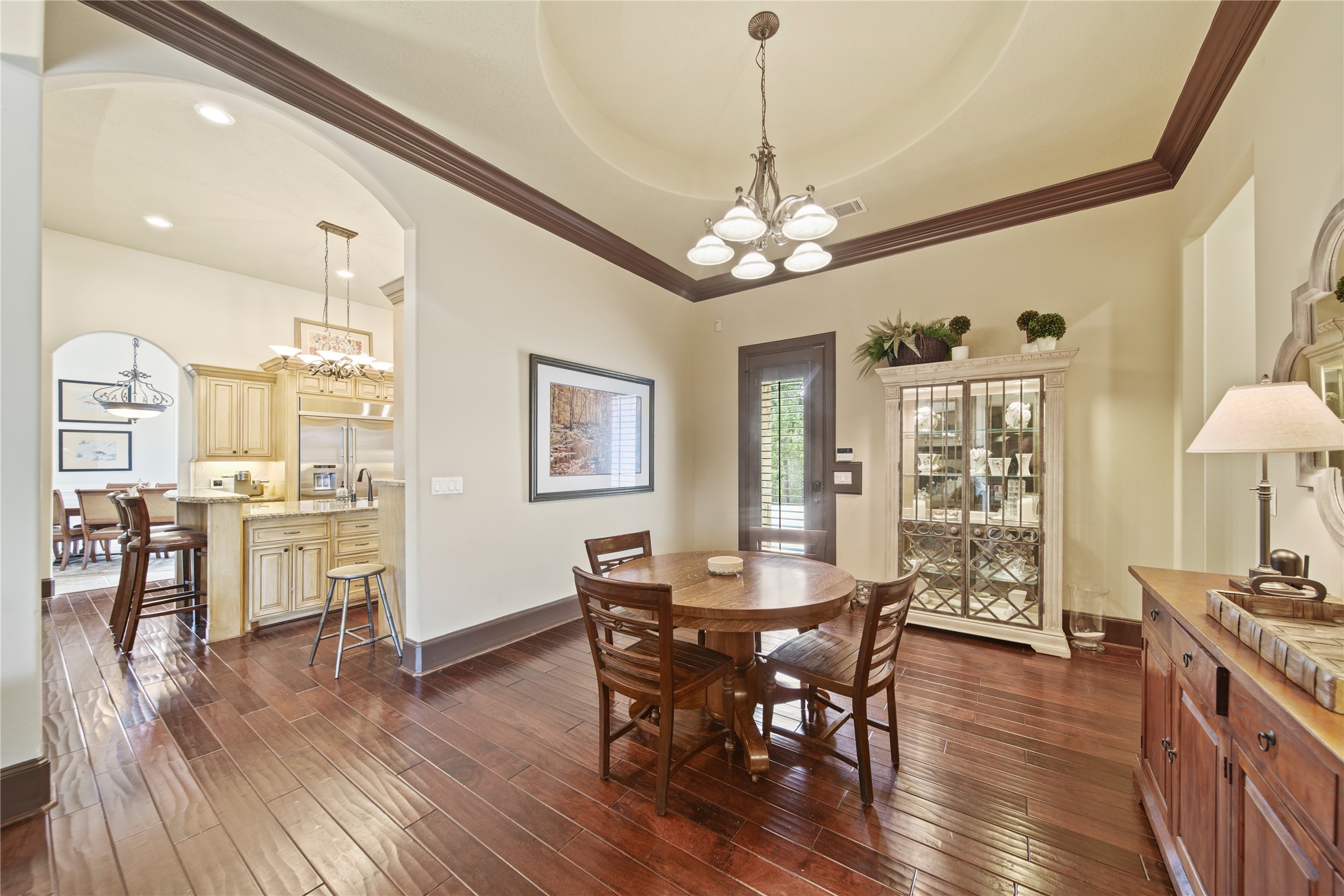 6702 Star Ledge Court Spring, TX 77389 - Photo 46 of 46 a view of a dining room with furniture window and wooden floor