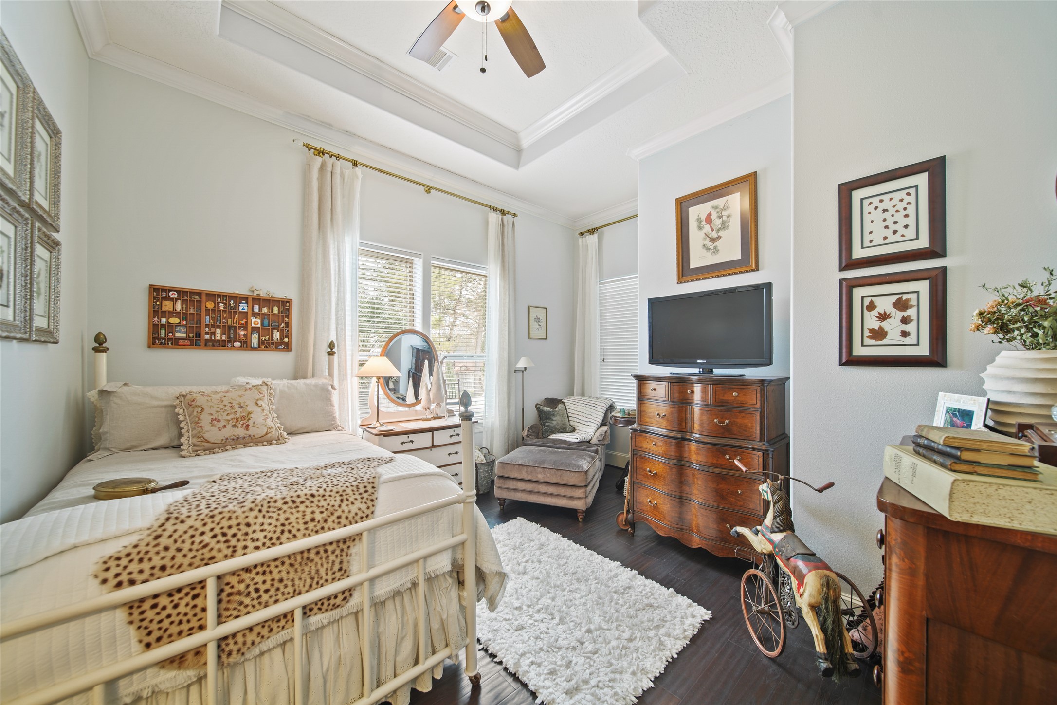 6702 Star Ledge Court Spring, TX 77389 - Photo 27 of 46 a bedroom with a bed and wooden floor