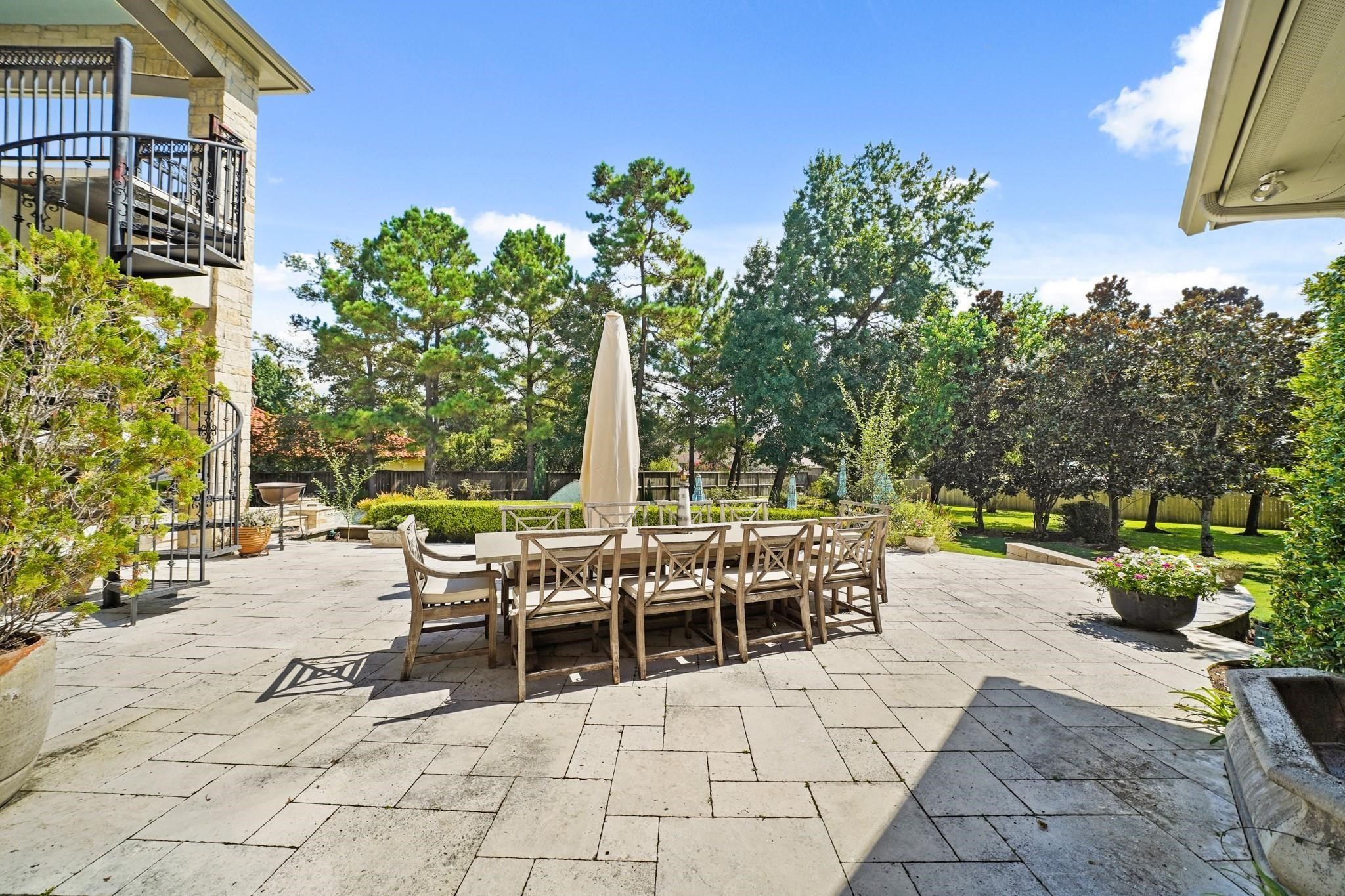 6702 Star Ledge Court Spring, TX 77389 - Photo 43 of 46 a view of a patio with table and chairs and potted plants