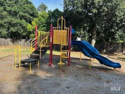 a view of balcony with wooden floor