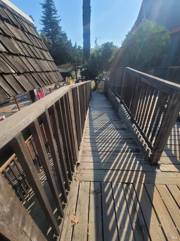 a living room filled with furniture and a rug