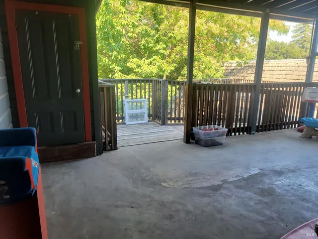 a room with toys and dresser