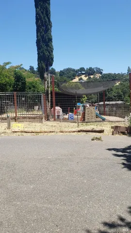 kids room with toys and wooden floor