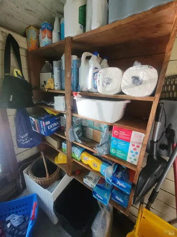 a view of a workspace with furniture