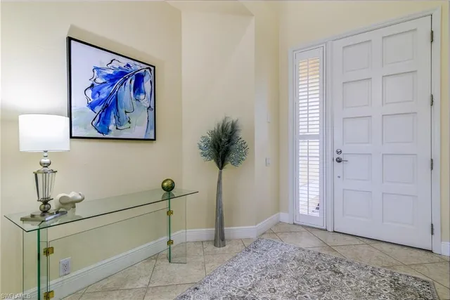 $595,000 | 66 Fountain Circle, Naples, FL 34119