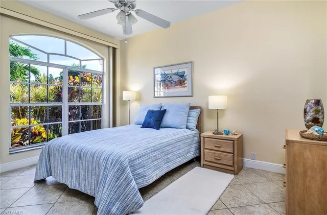 $595,000 | 66 Fountain Circle, Naples, FL 34119