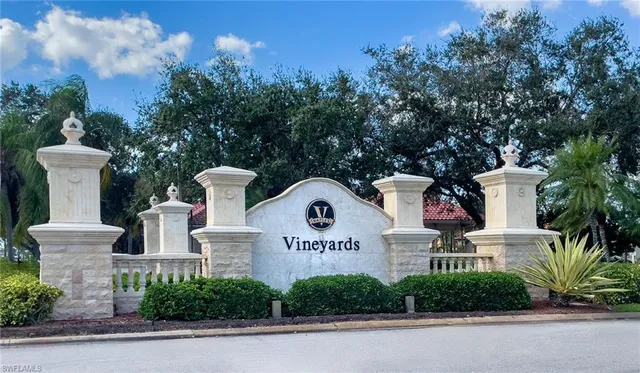 $595,000 | 66 Fountain Circle, Naples, FL 34119