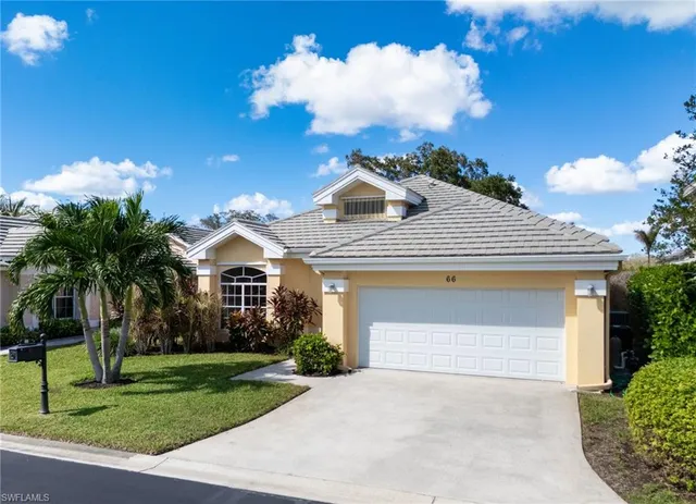 $595,000 | 66 Fountain Circle, Naples, FL 34119